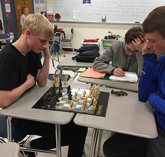 Students playing chess