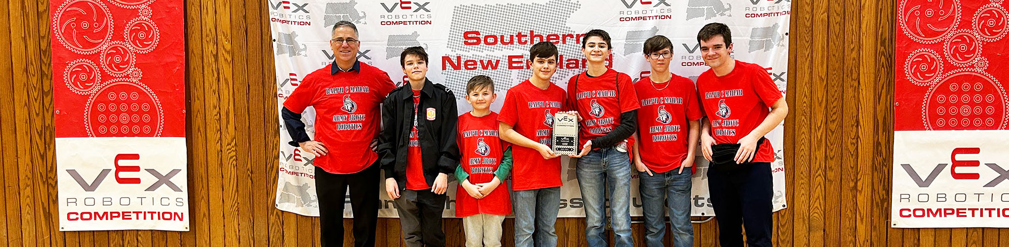2024 Robotics Competition team with coach
